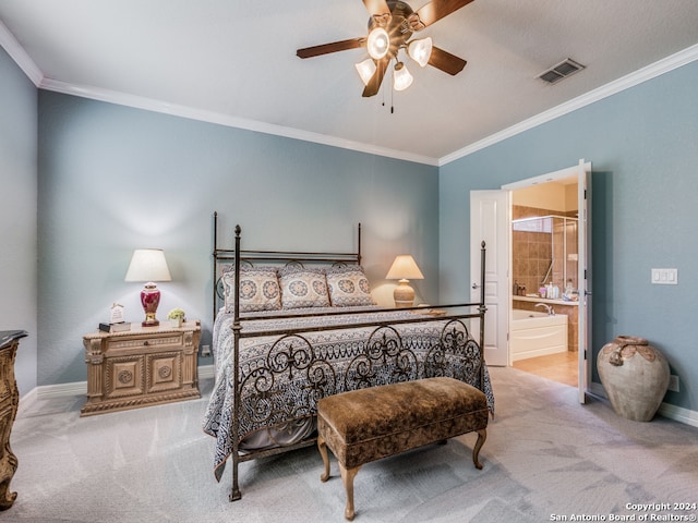 carpeted bedroom with connected bathroom, ceiling fan, and crown molding