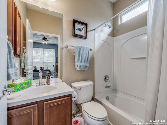 full bathroom featuring vanity, toilet, washtub / shower combination, and a wealth of natural light