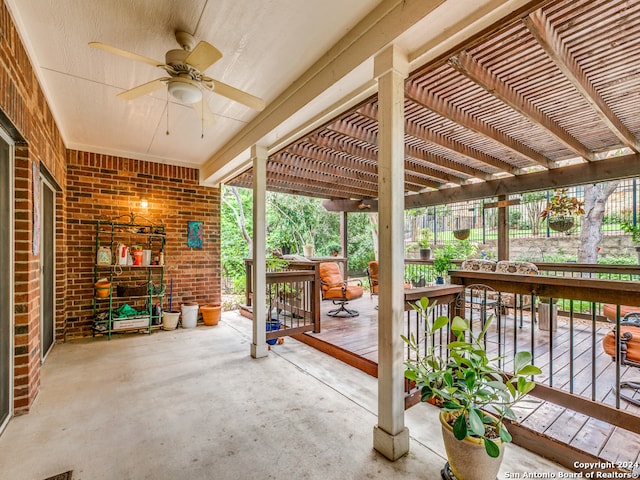 view of patio featuring a pergola and ceiling fan