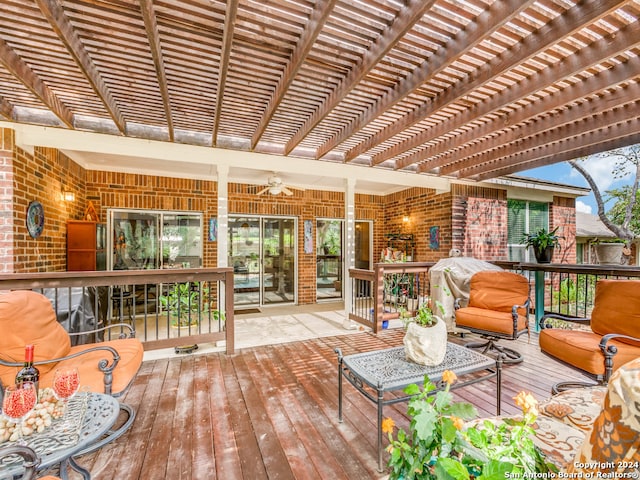 deck featuring a pergola and ceiling fan