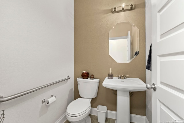 bathroom featuring toilet