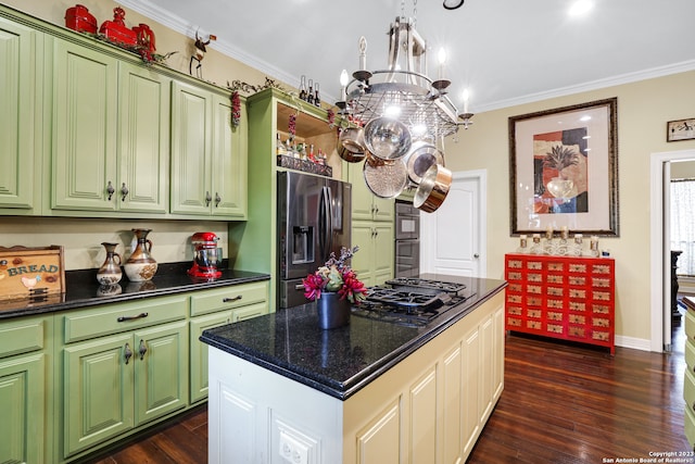 kitchen with appliances with stainless steel finishes, crown molding, dark hardwood / wood-style floors, and a notable chandelier