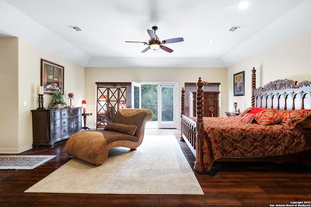 bedroom featuring ceiling fan, dark hardwood / wood-style floors, and access to outside