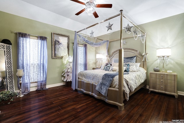 bedroom with ceiling fan and dark wood-type flooring