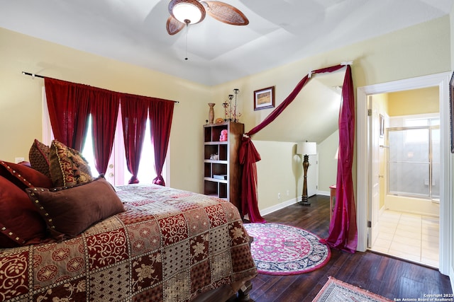 bedroom featuring ceiling fan, connected bathroom, and dark hardwood / wood-style floors