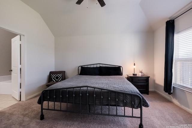 carpeted bedroom with lofted ceiling and ceiling fan