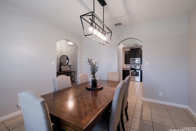 dining room featuring light tile patterned floors