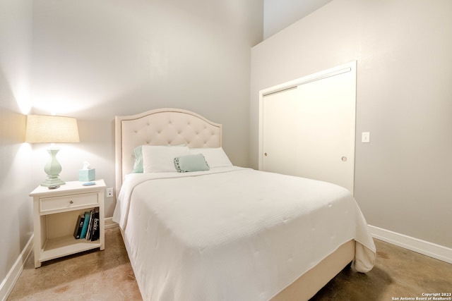 carpeted bedroom with a closet