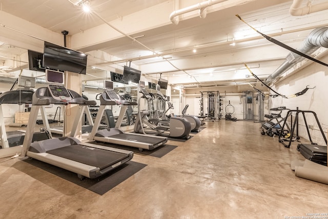 workout area featuring concrete floors