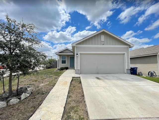 ranch-style house featuring a garage