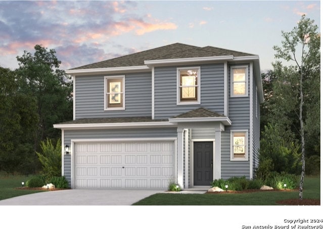 view of front of home featuring a garage