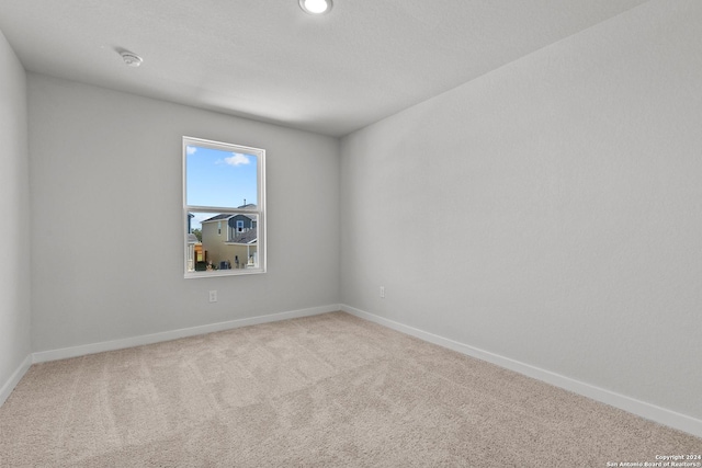 empty room with carpet floors