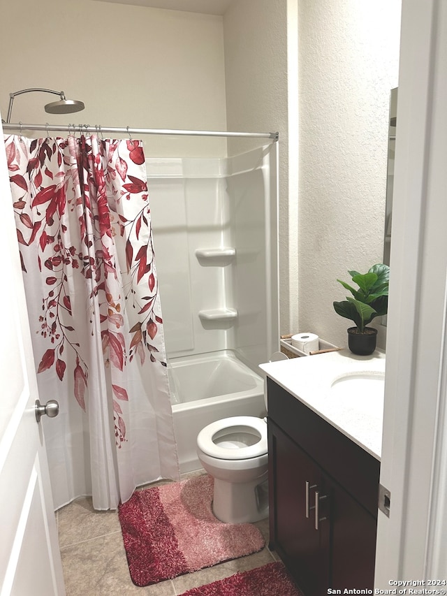 full bathroom featuring toilet, vanity, shower / bath combination with curtain, and tile patterned floors