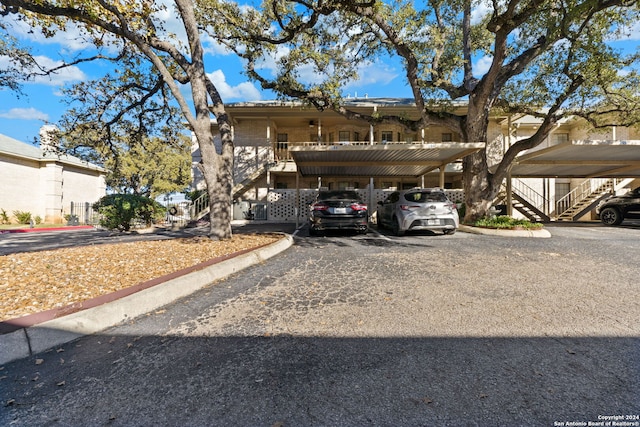 view of parking with a carport