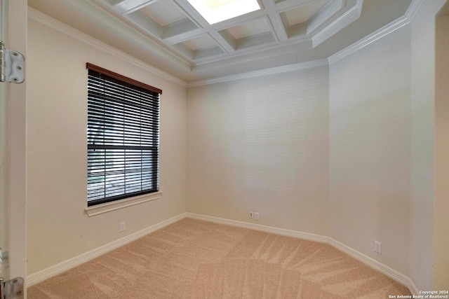 carpeted empty room featuring crown molding, coffered ceiling, and beamed ceiling