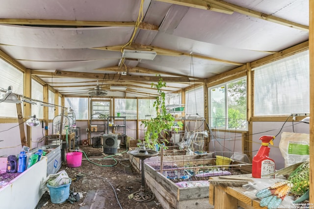 sunroom featuring lofted ceiling