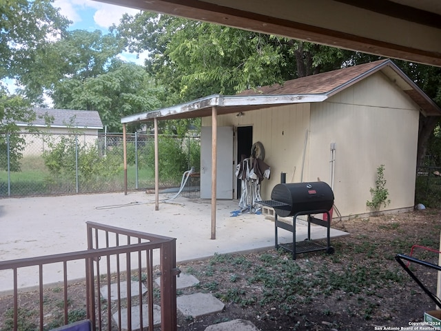 view of patio with a grill