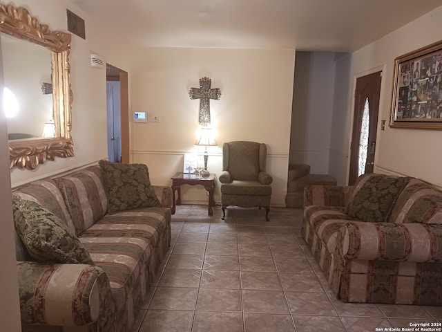 living room featuring tile patterned floors