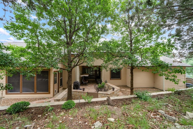 back of house featuring a patio area