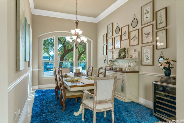 dining space with wine cooler, crown molding, a chandelier, and light tile patterned flooring