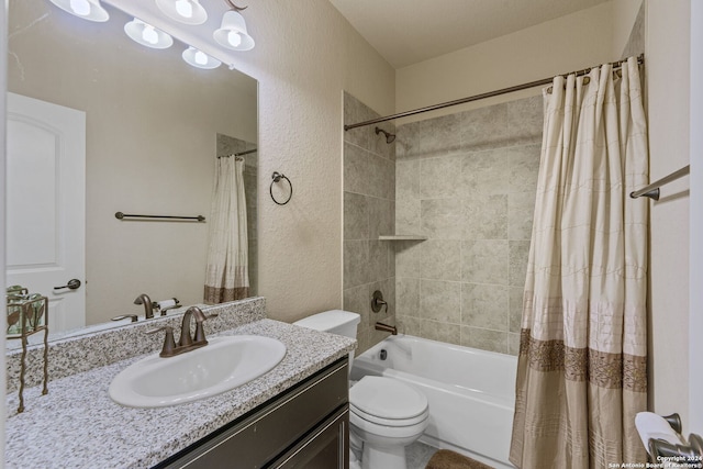 full bathroom with shower / bath combination with curtain, vanity, and toilet