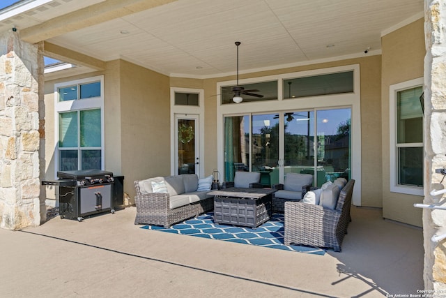 view of patio featuring ceiling fan, an outdoor living space, and grilling area