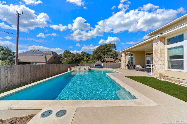 view of pool with a patio