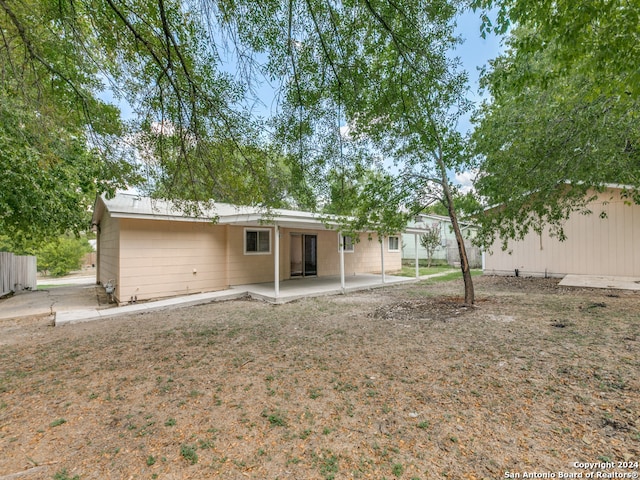 rear view of property with a patio