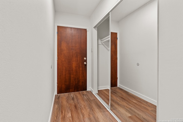 interior space with hardwood / wood-style floors