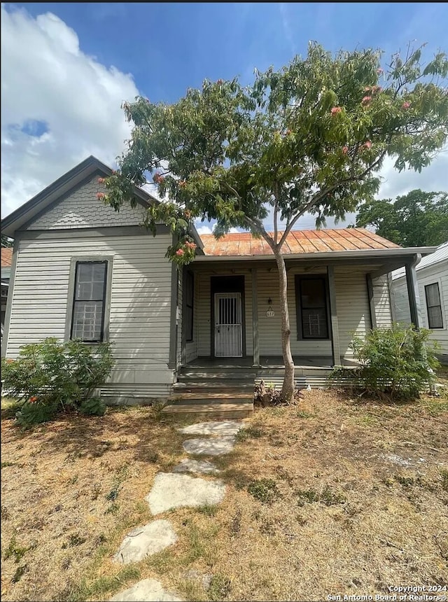 617 Montana St, San Antonio, TX 78203 - single story home with covered porch, metal roof, and a standing seam roof