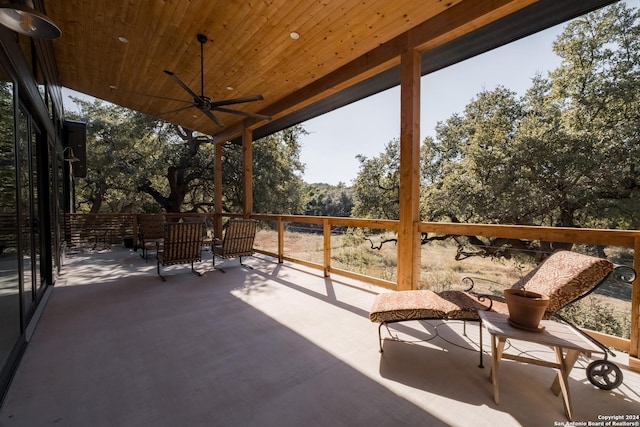 view of patio featuring ceiling fan