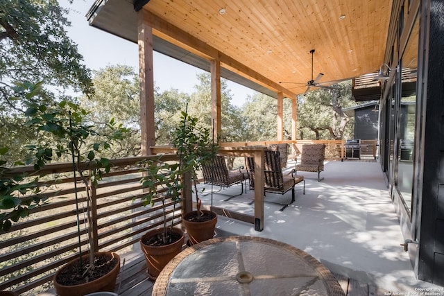 view of patio featuring ceiling fan