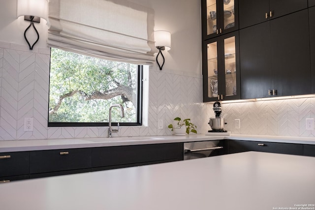 kitchen with decorative backsplash and sink