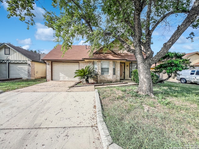 ranch-style house featuring a garage