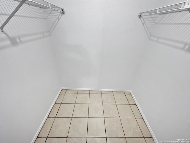 walk in closet featuring tile patterned floors