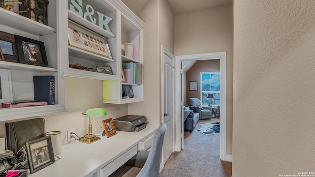 interior space featuring built in desk