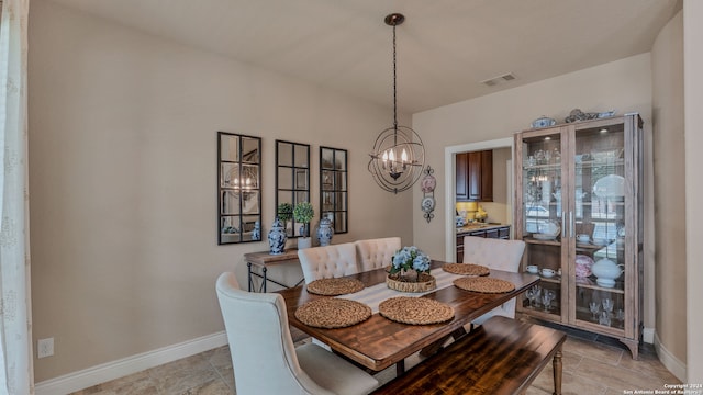 dining area featuring a chandelier