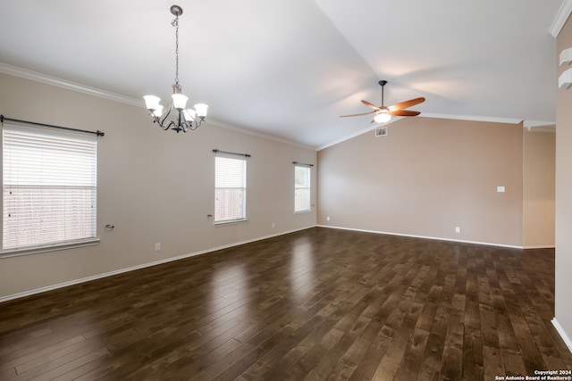 empty room with ceiling fan with notable chandelier, ornamental molding, dark hardwood / wood-style floors, and vaulted ceiling