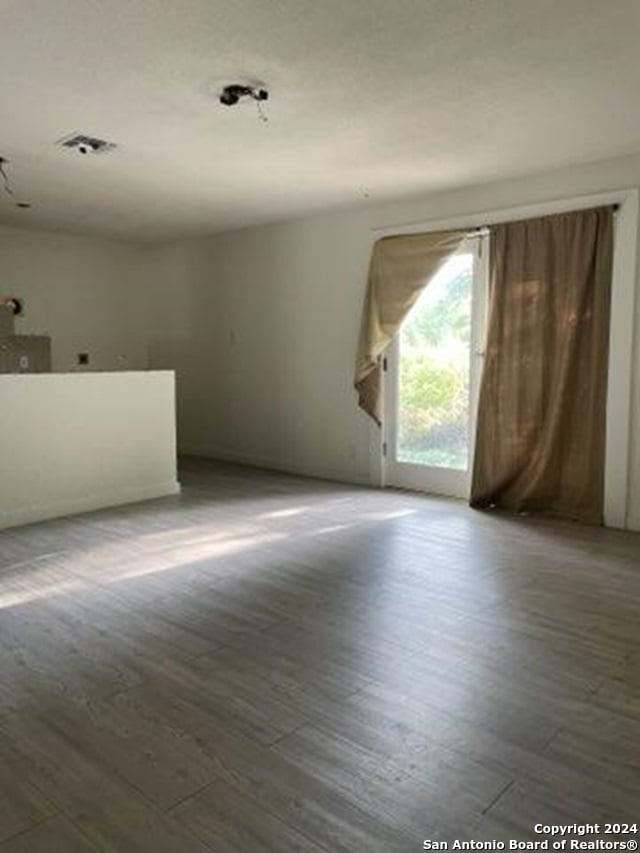 empty room featuring hardwood / wood-style floors