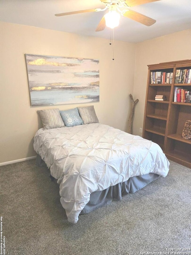 bedroom with carpet floors and ceiling fan