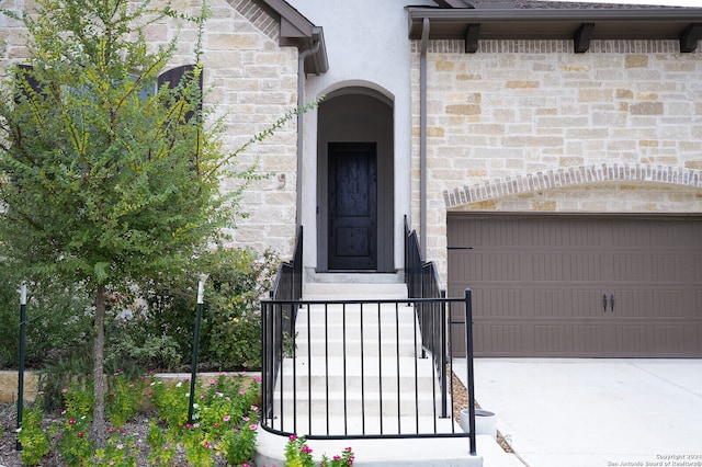 property entrance featuring a garage