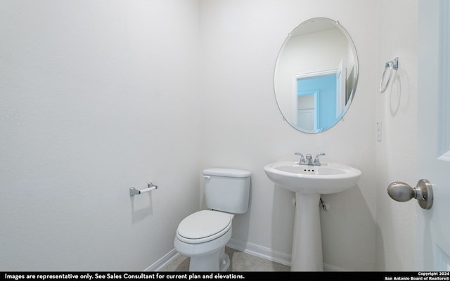 bathroom featuring toilet