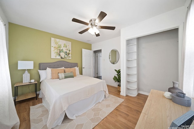 bedroom featuring ceiling fan and light hardwood / wood-style floors