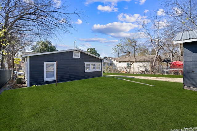 view of yard with central air condition unit