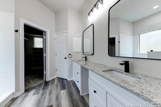 bathroom featuring vanity and hardwood / wood-style flooring