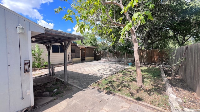 view of yard featuring a pergola and a patio area