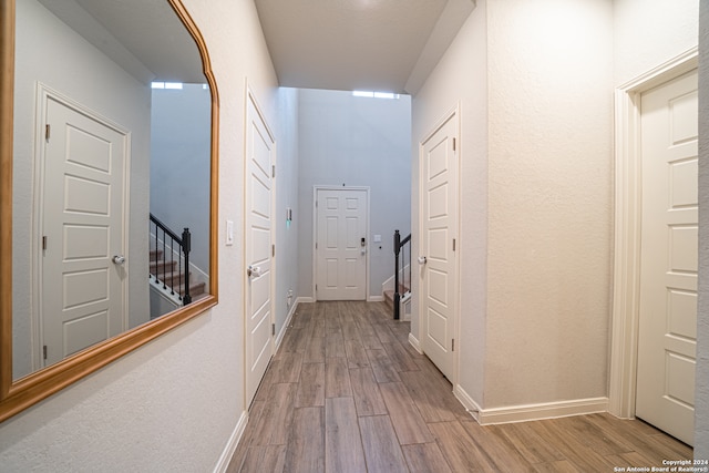 corridor featuring light wood-type flooring