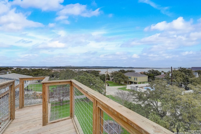 deck featuring a water view