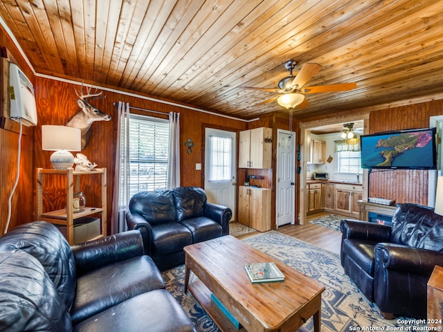 living room featuring wood ceiling, light hardwood / wood-style floors, wood walls, and ceiling fan