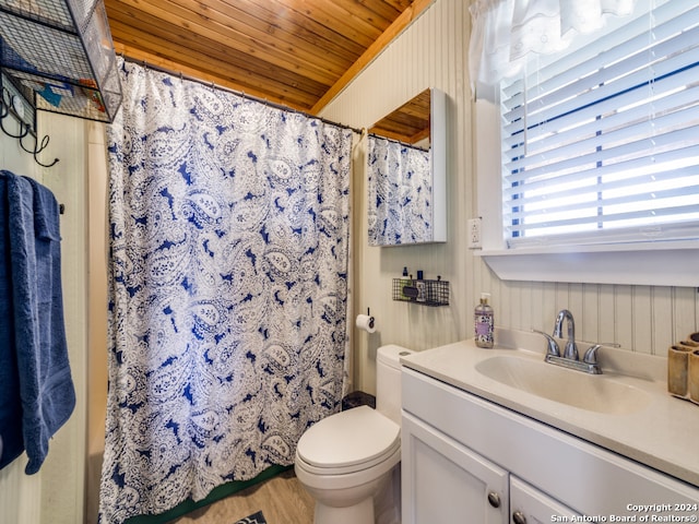 bathroom featuring hardwood / wood-style flooring, a shower with shower curtain, wooden ceiling, vanity, and toilet